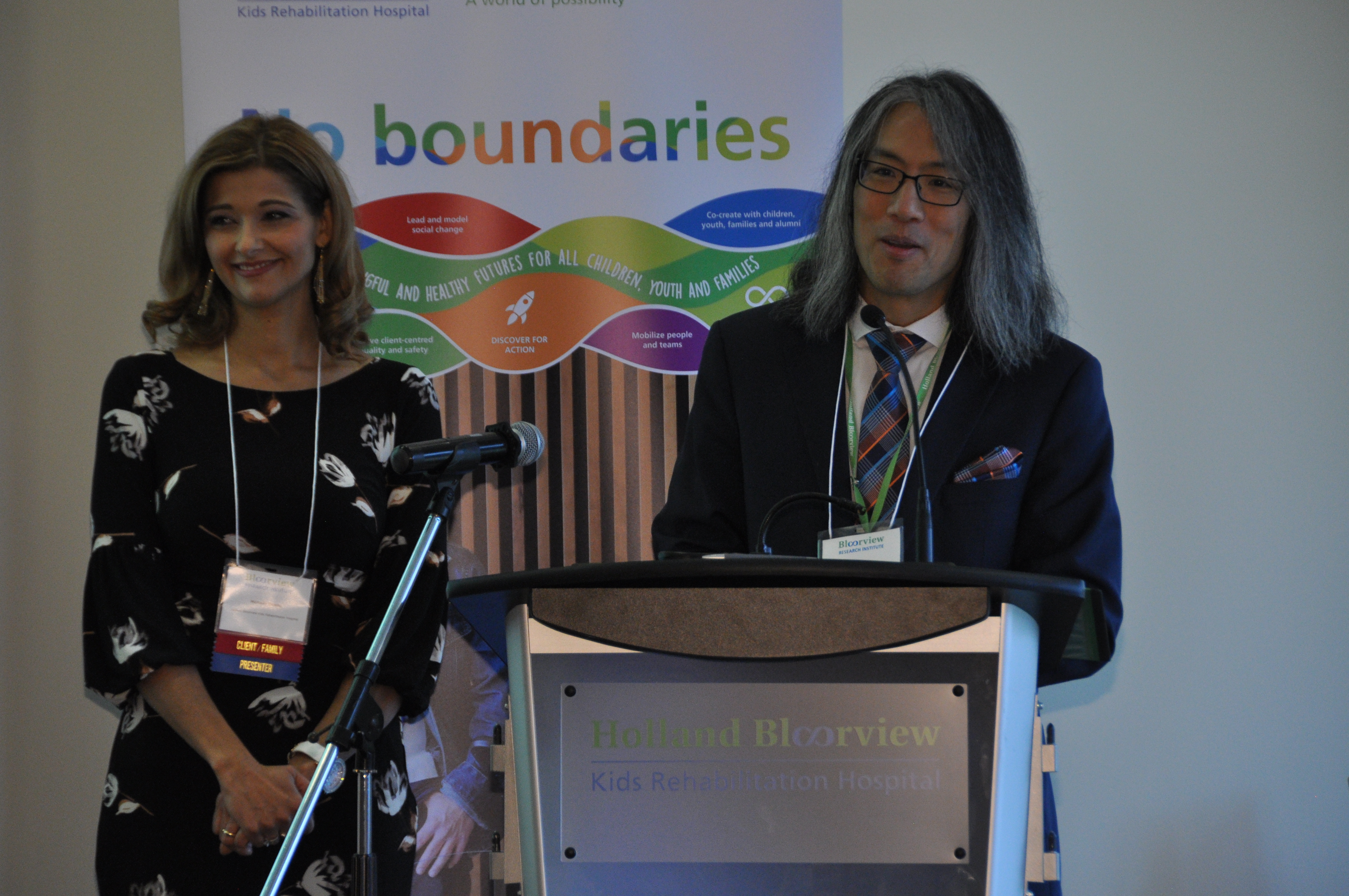Manuela Comito, family leader, Holland Bloorview; and Tom Chau, vice-president of research at Holland Bloorview co-host the event